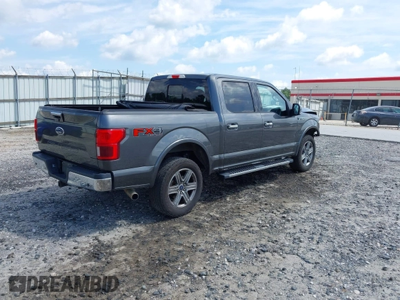 2018 Ford F-150 XL with VIN 1FTEW1E50JFD58356, listed as a IAAI auction lot 42456741 with 153,332 mi miles and . Bid and sale history available at DreamBid. Image 4.