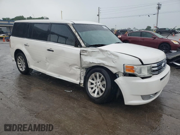 2009 Ford Flex SEL z VIN 2FMDK52CX9BA09974, wystawiony jako Copart lot #57184765 z przebiegiem 184 769 mil mil oraz Szkoda całkowita • Salvage title. Historia ofert i sprzedaży dostępna na DreamBid. Obrazek 4.