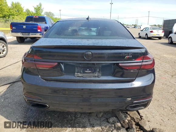 2016 BMW 7 Series 740i with VIN WBA7E2C56GG738788, listed as a Copart auction lot 60654015 with 96,059 mi miles and Clean title. Bid and sale history available at DreamBid. Image 6.