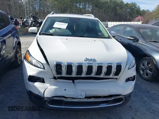2015 Jeep Cherokee Limited with VIN 1C4PJLDB9FW677367, listed as a IAAI auction lot 41826477 with 125,648 mi miles and . Bid and sale history available at DreamBid. Image 12.