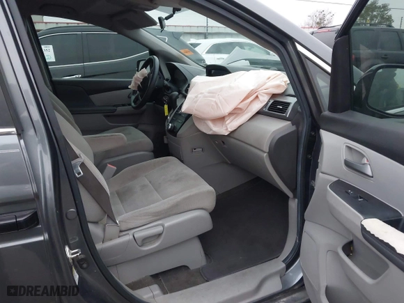 2013 Honda Odyssey LX with VIN 5FNRL5H24DB042230, listed as a IAAI auction lot 40954067 with 212,154 mi miles. Bid and sale history available at carsss.com. Image 5.