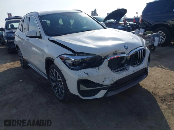 2022 BMW X1 sDrive28i with VIN WBXJG7C05N5U58988, listed as a IAAI auction lot 41466393 with 56,062 mi miles. Bid and sale history available at carsss.com. Image 1.