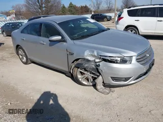 2014 Ford Taurus SEL z VIN 1FAHP2E86EG112945, wystawiony jako IAAI lot #41775067 z przebiegiem 120 955 mil mil oraz . Historia ofert i sprzedaży dostępna na DreamBid. Obrazek 1.
