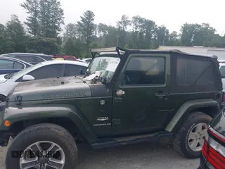 2008 Jeep Wrangler Sahara with VIN 1J4FA54118L653044, listed as a IAAI auction lot 42557244 with 152,072 mi miles and . Bid and sale history available at DreamBid. Image 14.