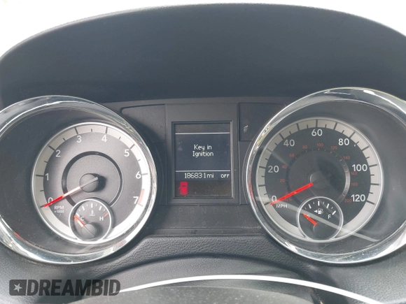 2014 Dodge Grand Caravan SXT with VIN 2C4RDGCG1ER304836, listed as a IAAI auction lot 42049558 with 186,831 mi miles and . Bid and sale history available at DreamBid. Image 7.
