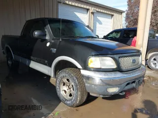 2000 Ford F-150 XL with VIN 1FTRX18LXYNA19385, listed as a IAAI auction lot 41075391 with 214,624 mi miles. Bid and sale history available at carsss.com. Image 1.