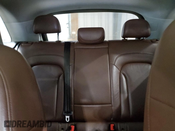 2015 Audi Q3 Prestige with VIN WA1GFCFS8FR012418, listed as a Copart auction lot 56099805 with 136,595 mi miles and Salvage title. Bid and sale history available at DreamBid. Image 10.