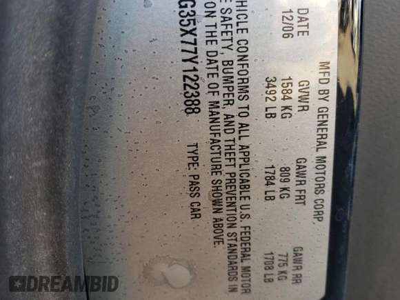 2007 Pontiac Solstice GXP z VIN 1G2MG35X77Y122388, wystawiony jako Copart lot #44040685 z przebiegiem 95 386 mil mil oraz Szkoda całkowita • Salvage title. Historia ofert i sprzedaży dostępna na DreamBid. Obrazek 13.