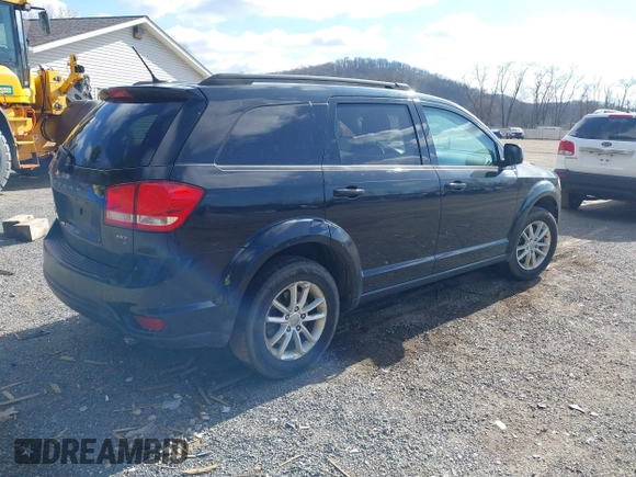 2015 Dodge Journey SXT with VIN 3C4PDDBG6FT561173, listed as a IAAI auction lot 41869022 with 185,106 mi miles and . Bid and sale history available at DreamBid. Image 4.