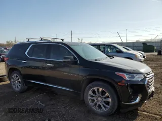 2018 Chevrolet Traverse Premier with VIN 1GNEVJKW5JJ152423, listed as a Copart auction lot 51202685 with 124,673 mi miles and Salvage Title. Bid and sale history available at DreamBid. Image 4.