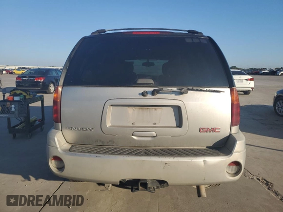 2006 GMC Envoy SLE with VIN 1GKDS13S962219216, listed as a Copart auction lot 71656164 with 328,966 mi miles and Salvage Title. Bid and sale history available at carsss.com. Image 6.
