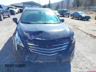 2018 Cadillac XT5 FWD with VIN 1GYKNARS5JZ235585, listed as a IAAI auction lot 41607440 with 77,220 mi miles and . Bid and sale history available at DreamBid. Image 12.