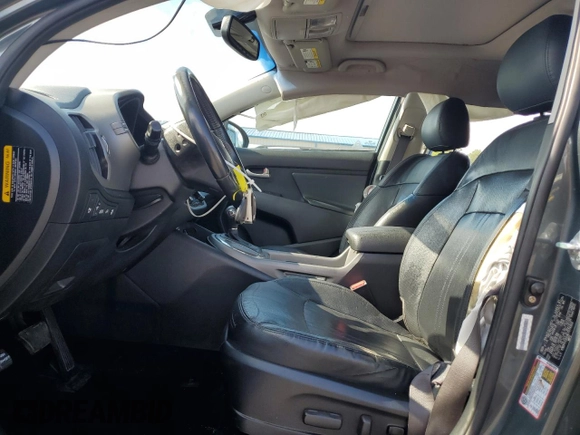 2014 Kia Sportage EX with VIN KNDPCCAC0E7574922, listed as a Copart auction lot 63299315 with 150,905 mi miles and Salvage title. Bid and sale history available at DreamBid. Image 7.