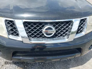 2008 Nissan Pathfinder S with VIN 5N1AR18U98C640561, listed as a IAAI auction lot 42126104 with 233,243 mi miles. Bid and sale history available at carsss.com. Image 6.