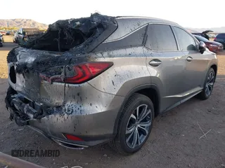 2022 Lexus RX with VIN 2T2HZMDA9NC332661, listed as a IAAI auction lot 41877725 with 19,045 mi miles. Bid and sale history available at carsss.com. Image 4.