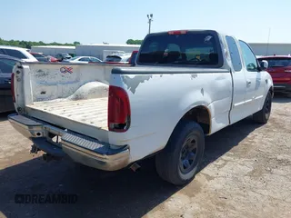 2001 Ford F-150 z VIN 1FTPX17LX1KB15016, wystawiony jako IAAI lot #42320637 z przebiegiem 567 424 mil mil oraz . Historia ofert i sprzedaży dostępna na DreamBid. Obrazek 4.