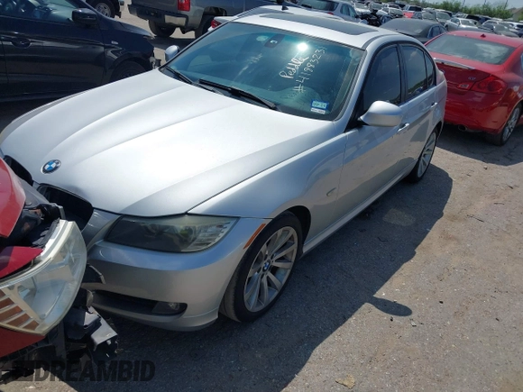 2011 BMW 3 Series 328i with VIN WBAPH7G57BNM58073, listed as a IAAI auction lot 41883231 with 144,539 mi miles. Bid and sale history available at carsss.com. Image 2.
