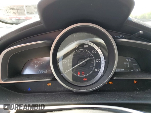 2017 Mazda CX-3 Touring z VIN JM1DKFC76H0149368, wystawiony jako Copart lot #55747305 z przebiegiem 47 946 mil mil oraz Szkoda całkowita • Salvage title. Historia ofert i sprzedaży dostępna na DreamBid. Obrazek 9.