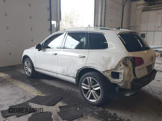 2013 Volkswagen Touareg Lux with VIN WVGEF9BP6DD007323, listed as a IAAI auction lot 41488959 with 123,383 mi miles and . Bid and sale history available at DreamBid. Image 3.