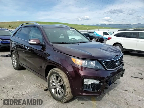 2013 Kia Sorento SX z VIN 5XYKWDA22DG389884, wystawiony jako Copart lot #58813735 z przebiegiem 101 567 mil mil oraz Szkoda całkowita • Salvage title. Historia ofert i sprzedaży dostępna na DreamBid. Obrazek 15.