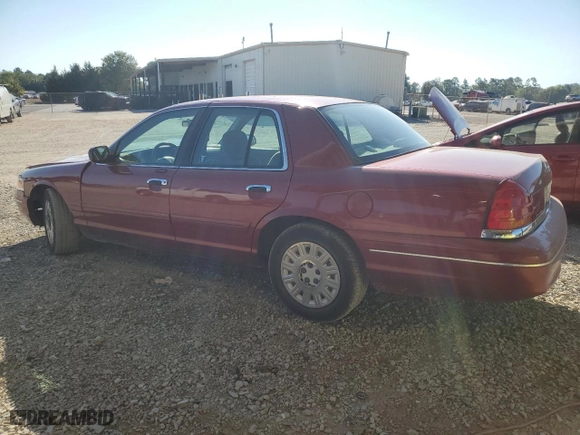 2003 Ford Crown Victoria Standard with VIN 2FAFP73W83X161187, listed as a Copart auction lot 72444624 with 128,045 mi miles and Salvage Title. Bid and sale history available at carsss.com. Image 2.