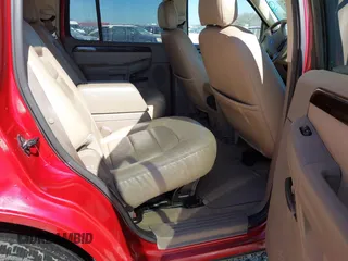 2004 Ford Explorer Limited z VIN 1FMZU65W34UC06404, wystawiony jako IAAI lot #41666862 z przebiegiem 92 132 mil mil oraz . Historia ofert i sprzedaży dostępna na DreamBid. Obrazek 8.