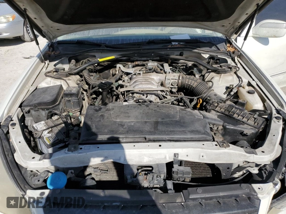 2005 Infiniti Q45 z VIN JNKBF01A85M100070, wystawiony jako Copart lot #82127494 z przebiegiem 176 578 mil mil oraz Szkoda całkowita • Salvage title. Historia ofert i sprzedaży dostępna na DreamBid. Obrazek 11.