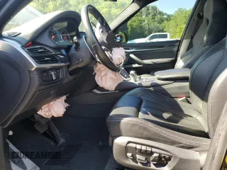 2018 BMW X5 M z VIN 5YMKT6C54J0Y83460, wystawiony jako Copart lot #57874275 z przebiegiem 58 656 mil mil oraz Szkody całkowita. Historia ofert i sprzedaży dostępna na DreamBid. Obrazek 7.