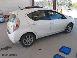 2012 Toyota Prius c One with VIN JTDKDTB35C1015176, listed as a IAAI auction lot 42053659 with 94,565 mi miles. Bid and sale history available at carsss.com. Image 4.
