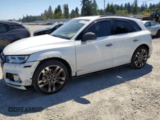 2019 Audi SQ5 Premium Plus with VIN WA1B4AFY7K2098106, listed as a Copart auction lot 63123165 with 64,867 mi miles and Salvage title. Bid and sale history available at DreamBid. Image 1.