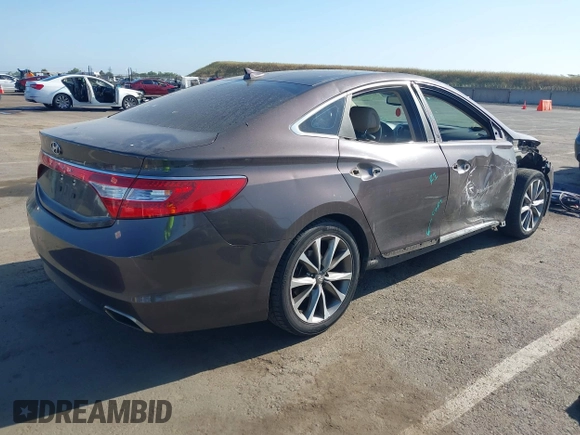 2015 Hyundai Azera with VIN KMHFG4JGXFA439603, listed as a IAAI auction lot 42157274 with 135,990 mi miles and . Bid and sale history available at carsss.com. Image 4.