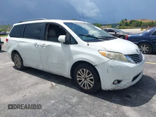2014 Toyota Sienna XLE with VIN 5TDYK3DC4ES414728, listed as a IAAI auction lot 42588916 with 291,007 mi miles and . Bid and sale history available at DreamBid. Image 1.