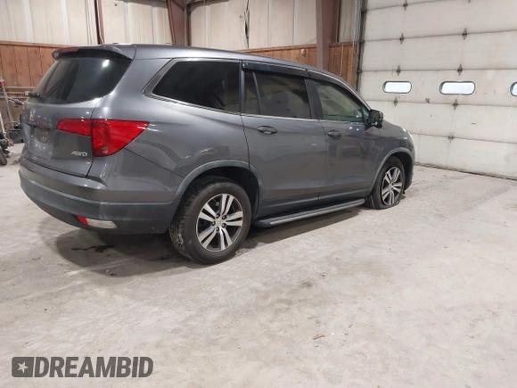 2016 Honda Pilot EX-L with VIN 5FNYF6H5XGB010230, listed as a IAAI auction lot 41858811 with 194,119 mi miles. Bid and sale history available at carsss.com. Image 4.