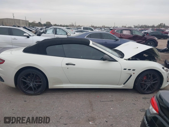 2013 Maserati GranTurismo Convertible Sport with VIN ZAM45VMA9D0070293, listed as a IAAI auction lot 41241020 with 69,156 mi miles. Bid and sale history available at carsss.com. Image 13.