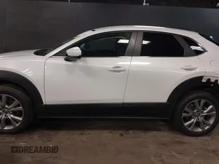 2021 Mazda CX-30 Preferred z VIN 3MVDMBCL2MM210902, wystawiony jako IAAI lot #42522203 z przebiegiem 42 995 mil mil oraz . Historia ofert i sprzedaży dostępna na DreamBid. Obrazek 15.