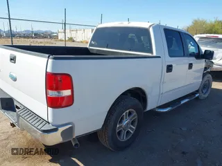 2007 Ford F-150 XLT with VIN 1FTPW12517KD34256, listed as a IAAI auction lot 41828504 with 163,516 mi miles. Bid and sale history available at carsss.com. Image 4.