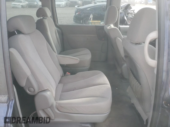 2009 Kia Sedona LX with VIN KNDMB233196304400, listed as a Copart auction lot 70311604 with 0 mi miles and Salvage Title. Bid and sale history available at carsss.com. Image 12.