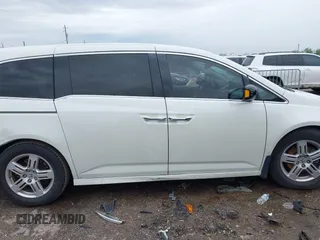 2013 Honda Odyssey Touring with VIN 5FNRL5H96DB074819, listed as a IAAI auction lot 41898358 with 123,428 mi miles and . Bid and sale history available at carsss.com. Image 13.