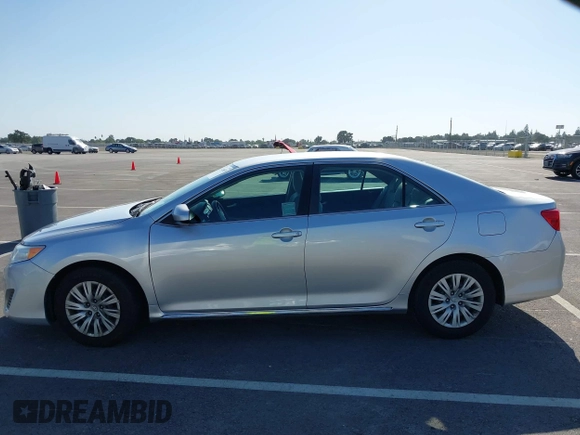 2014 Toyota Camry L with VIN 4T4BF1FK5ER442960, listed as a IAAI auction lot 42206639 with 119,639 mi miles and . Bid and sale history available at DreamBid. Image 14.