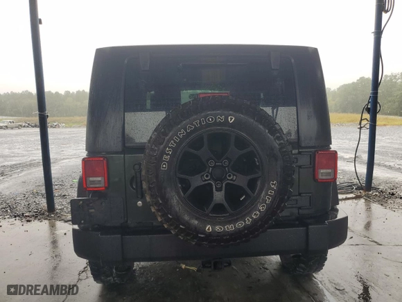 2010 Jeep Wrangler Mountain with VIN 1J4AA2D1XAL176452, listed as a Copart auction lot 72231974 with 117,610 mi miles and Salvage Title. Bid and sale history available at carsss.com. Image 6.