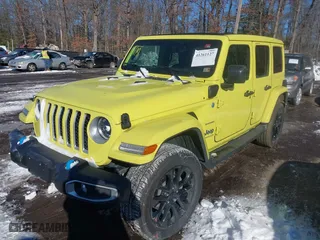 2023 Jeep Wrangler 4xe Sahara with VIN 1C4JJXP66PW580527, listed as a IAAI auction lot 41261127 with 15,100 mi miles. Bid and sale history available at carsss.com. Image 17.