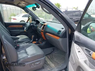 2003 Lexus GX 470 with VIN JTJBT20X230011298, listed as a IAAI auction lot 42251252 with 177,140 mi miles and . Bid and sale history available at DreamBid. Image 5.