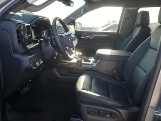 2025 Chevrolet Silverado 1500 with VIN 3GCUKFE80SG128699, listed as a Copart auction lot 52393645 with 5,759 mi miles and Salvage Title. Bid and sale history available at DreamBid. Image 7.