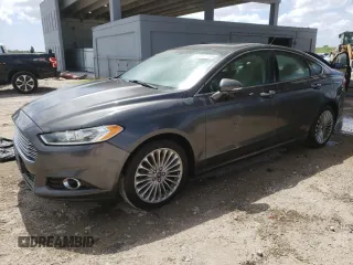 2016 Ford Fusion Titanium z VIN 3FA6P0K91GR369953, wystawiony jako Copart lot #67312305 z przebiegiem 135 516 mil mil oraz Czysty tytuł • Clean title. Historia ofert i sprzedaży dostępna na DreamBid. Obrazek 1.