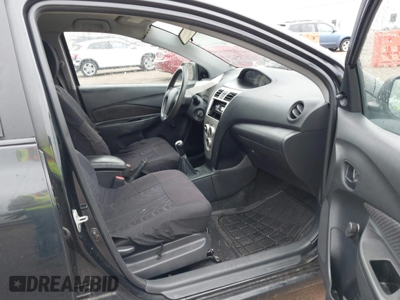 2007 Toyota Yaris with VIN JTDBT923271036255, listed as a IAAI auction lot 42014320 with 236,510 mi miles. Bid and sale history available at carsss.com. Image 5.