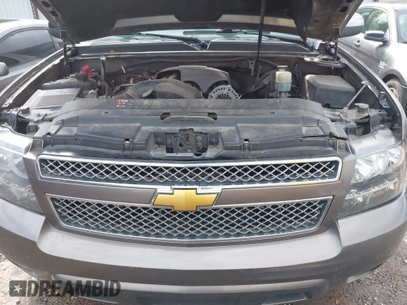 2011 Chevrolet Suburban LT with VIN 1GNSCJE03BR267184, listed as a IAAI auction lot 42156424 with 307,618 mi miles. Bid and sale history available at carsss.com. Image 10.