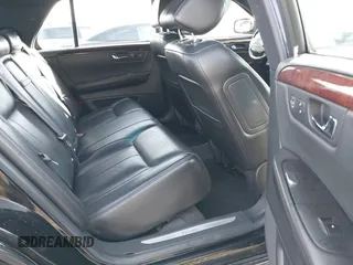 2006 Cadillac DTS 1SC z VIN 1G6KD57YX6U100634, wystawiony jako IAAI lot #41671007 z przebiegiem Nie podano mil oraz . Historia ofert i sprzedaży dostępna na DreamBid. Obrazek 8.