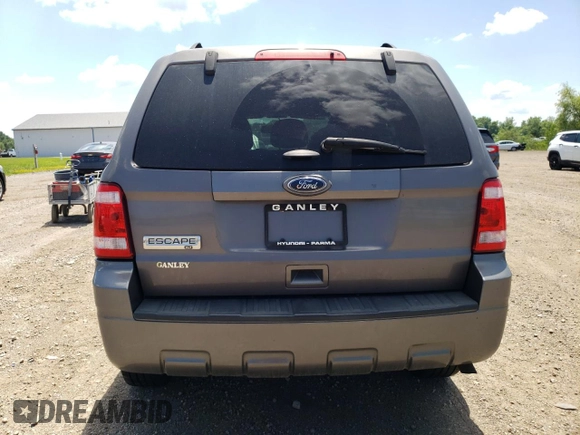 2012 Ford Escape XLT z VIN 1FMCU9D73CKA70061, wystawiony jako Copart lot #63571585 z przebiegiem 130 275 mil mil oraz Czysty tytuł • Clean title. Historia ofert i sprzedaży dostępna na DreamBid. Obrazek 6.