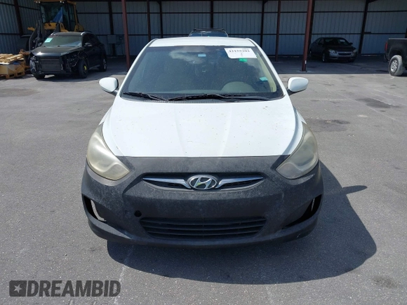2014 Hyundai Accent GLS with VIN KMHCT4AE1EU590386, listed as a IAAI auction lot 42155202 with 248,545 mi miles. Bid and sale history available at carsss.com. Image 6.
