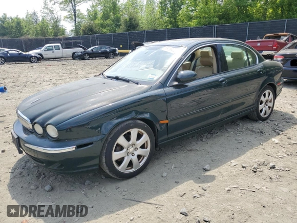 2004 Jaguar X-Type with VIN SAJEA51C64WE17722, listed as a Copart auction lot 55416405 with 89,047 mi miles and Salvage Title. Bid and sale history available at DreamBid. Image 1.